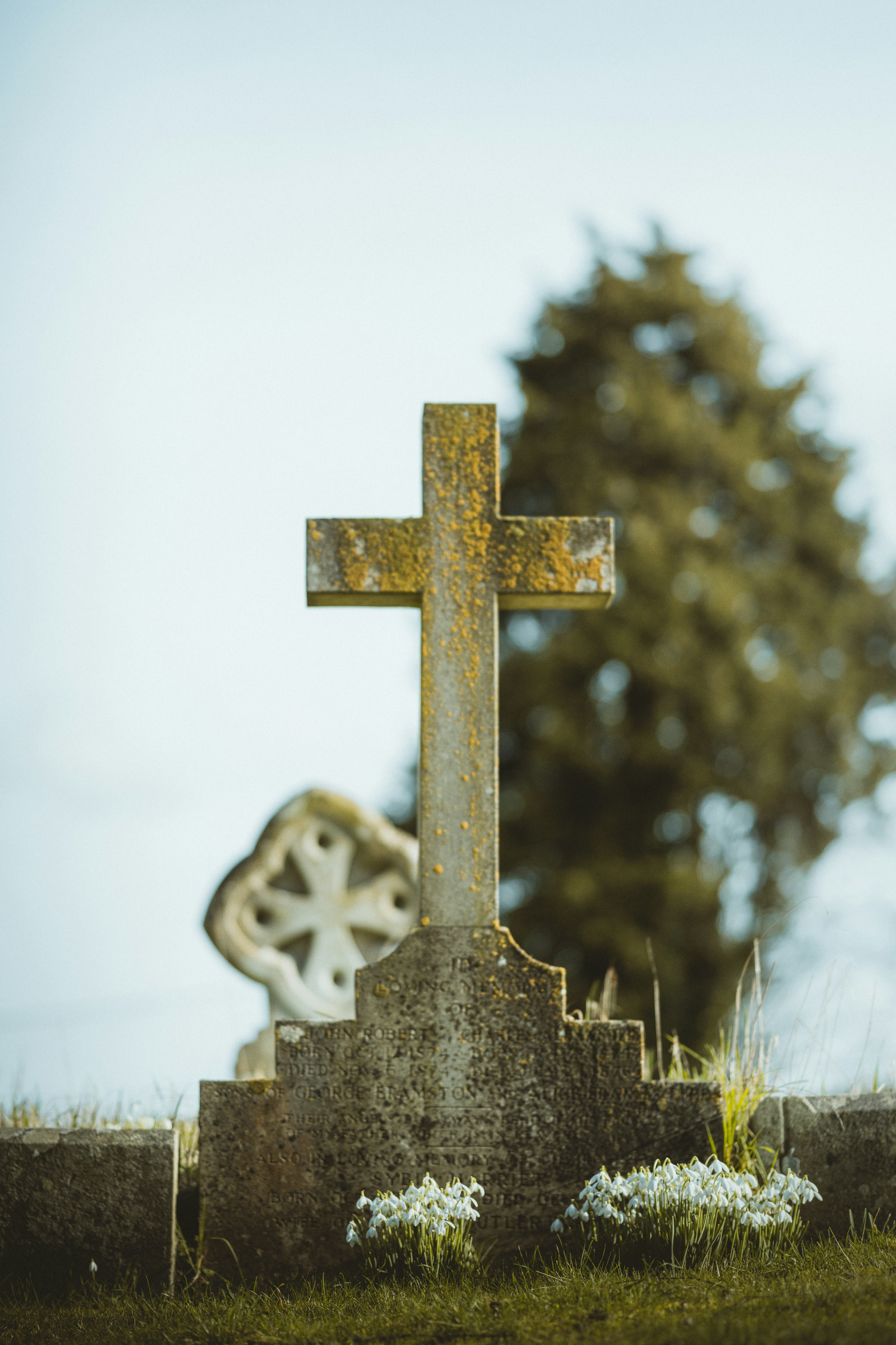 grey cross with cross on top